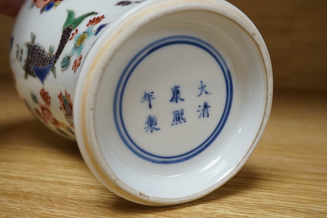 A Chinese wucai ‘fish and flower’ vase, 26cm